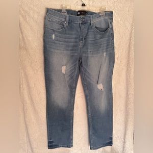 Comfortable men’s slightly ripped jeans.
